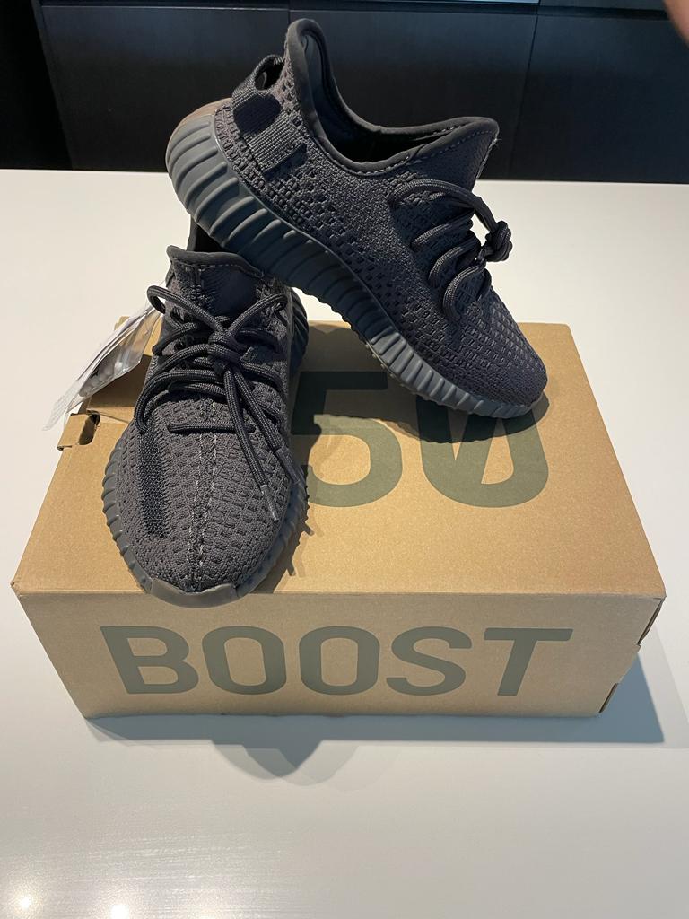Yeezys charcoal black stripe