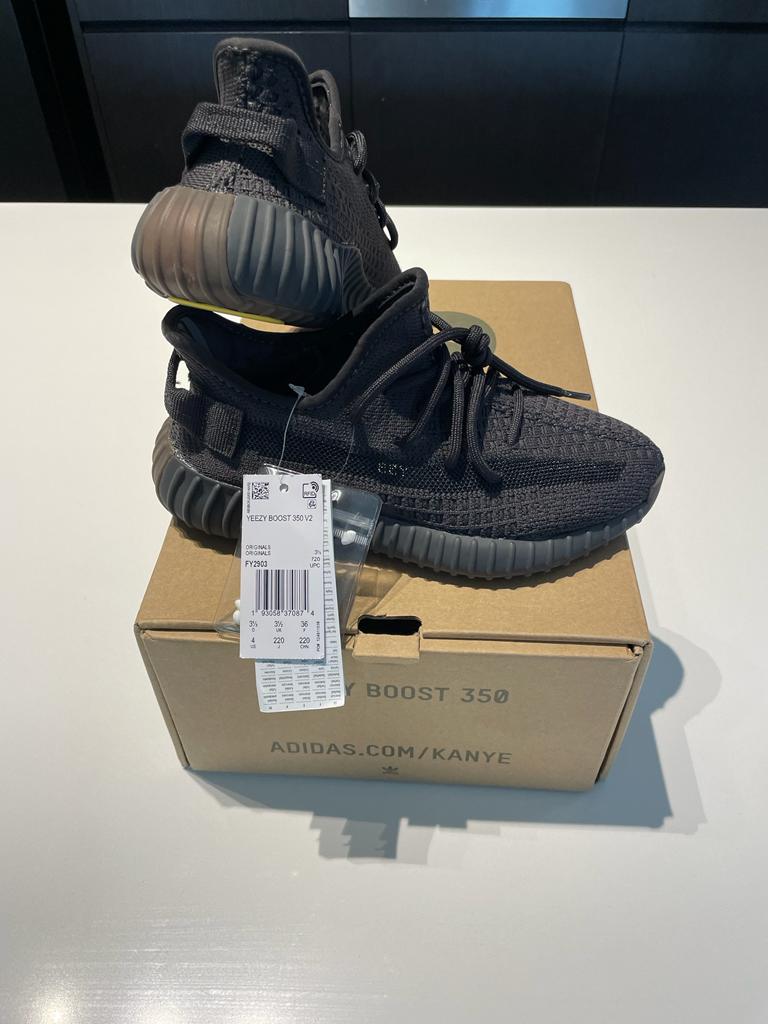 Yeezys charcoal black stripe