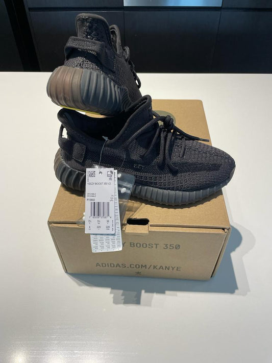Yeezys charcoal black stripe